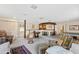 Spacious finished basement with bar area, game table, multiple seating areas, and ample lighting at 5008 Hermitage Dr, Raleigh, NC 27612
