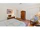 Comfortable bedroom with classic furniture, wood floors, and an inviting atmosphere at 5008 Hermitage Dr, Raleigh, NC 27612