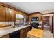 Classic kitchen featuring a butcher block island, farmhouse sink, and updated appliances at 5008 Hermitage Dr, Raleigh, NC 27612