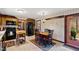 Charming eat-in kitchen featuring an island, updated appliances, and tile flooring at 5008 Hermitage Dr, Raleigh, NC 27612