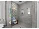 Modern bathroom featuring a glass shower with mosaic tile and a built-in bench at 505 Colleton Rd, Raleigh, NC 27610