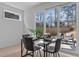 Dining area with sliding glass doors that provide outdoor access and natural light at 505 Colleton Rd, Raleigh, NC 27610