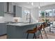 Stylish kitchen island with seating and modern appliances, perfect for entertaining at 505 Colleton Rd, Raleigh, NC 27610