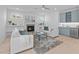 Bright living room featuring a fireplace, white sofas, and stylish decor at 505 Colleton Rd, Raleigh, NC 27610