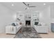 Inviting living room with a cozy fireplace and comfortable seating arrangement at 505 Colleton Rd, Raleigh, NC 27610
