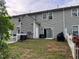 A backyard with a white picket fence and a patio is perfect for relaxing and entertaining at 5264 Patuxent Dr, Raleigh, NC 27616