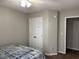 Bedroom featuring a bed, closet, and neutral wall paint at 5264 Patuxent Dr, Raleigh, NC 27616