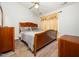 Comfortable bedroom with a ceiling fan, window with curtains, and neutral color scheme at 5264 Patuxent Dr, Raleigh, NC 27616