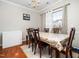 Well-lit dining room featuring a chandelier and a dining table with chairs at 5264 Patuxent Dr, Raleigh, NC 27616