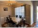 Inviting dining room featuring a chandelier and a table set for a pleasant meal at 5264 Patuxent Dr, Raleigh, NC 27616