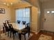 Inviting dining room featuring a chandelier and a table set for a pleasant meal at 5264 Patuxent Dr, Raleigh, NC 27616