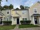 Charming townhome featuring well-maintained landscaping and a welcoming entrance at 5264 Patuxent Dr, Raleigh, NC 27616