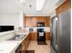 Modern kitchen with stainless steel appliances, and ample counter space at 5264 Patuxent Dr, Raleigh, NC 27616
