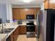 Well-equipped kitchen featuring modern appliances and ample counter space at 5264 Patuxent Dr, Raleigh, NC 27616