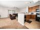 Inviting living room and kitchen featuring a comfortable seating area at 5264 Patuxent Dr, Raleigh, NC 27616