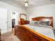 Inviting main bedroom with a walk-in closet, dresser, and a comfortable bed at 5264 Patuxent Dr, Raleigh, NC 27616