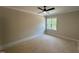 Bedroom featuring a ceiling fan and a window overlooking green exterior views at 55 Cherry Bark Dr, Youngsville, NC 27596