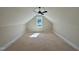 Attic bedroom offering natural light and a cozy atmosphere at 55 Cherry Bark Dr, Youngsville, NC 27596