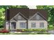 An attractive new build rendering with a stylish design, complemented by a well-manicured lawn and professional landscaping at 55 Cherry Bark Dr, Youngsville, NC 27596