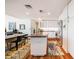Open floorplan with kitchen, dining, and living areas at 601 W Rosemary St # 403, Chapel Hill, NC 27516
