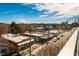 Aerial view of businesses, rooftops and street with parking, sidewalk and pedestrians at 601 W Rosemary St # 403, Chapel Hill, NC 27516