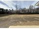 Spacious backyard, soon to be lush with greenery, perfect for outdoor activities at 73 Phil Jack Rd, Dunn, NC 28334