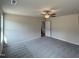 Bedroom featuring carpeted floors, neutral paint, ceiling fan and access to the ensuite bath at 73 Phil Jack Rd, Dunn, NC 28334