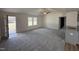 Bright living room with neutral walls, carpet and a ceiling fan at 73 Phil Jack Rd, Dunn, NC 28334