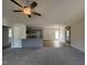 Spacious open concept kitchen and living area, with ceiling fan and recessed lighting at 73 Phil Jack Rd, Dunn, NC 28334
