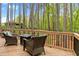 Inviting back deck featuring comfortable seating and a peaceful wooded view, perfect for relaxation and entertaining at 749 Bowden Rd, Chapel Hill, NC 27516