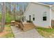 Home features a deck and patio, perfect for outdoor entertaining and relaxing in the backyard at 749 Bowden Rd, Chapel Hill, NC 27516