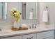 Modern bathroom showcasing a double sink vanity with chrome fixtures and quartz countertop at 749 Bowden Rd, Chapel Hill, NC 27516