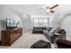 Large living room with carpeted floors, and a ceiling fan at 749 Bowden Rd, Chapel Hill, NC 27516