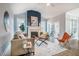 Inviting living room with a fireplace and comfortable seating at 749 Bowden Rd, Chapel Hill, NC 27516