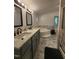 Elegant bathroom with double sink vanity, jacuzzi tub, marble floors and shower at 88 Barnes Rd, Middlesex, NC 27557