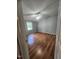 Bedroom featuring hardwood floors, a ceiling fan, neutral walls, and natural light from a window at 88 Barnes Rd, Middlesex, NC 27557