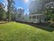 Charming single-story home with a large yard and a screened porch area at 88 Barnes Rd, Middlesex, NC 27557