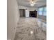 Open living area with stone fireplace and large windows for lots of natural light at 88 Barnes Rd, Middlesex, NC 27557