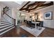 Formal dining room boasts a decorative ceiling, stylish light fixture, and convenient access to the kitchen at , Efland, NC 27243