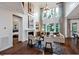Comfortable living room featuring a fireplace, hardwood floors, and open view of the bedroom at , Efland, NC 27243