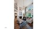 Bright living room with soaring ceilings, fireplace, lots of natural light, and hardwood floors at , Efland, NC 27243