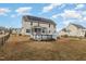 Two-story home featuring an above ground pool, screened porch, deck, solar panels, and fenced yard at 104 Coats Ridge Dr, Benson, NC 27504