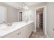 Bathroom features a double sink vanity, large mirror, and walk-in shower at 104 Coats Ridge Dr, Benson, NC 27504