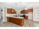 Modern kitchen with granite countertops, stainless steel appliances, and ample cabinet space at 104 Coats Ridge Dr, Benson, NC 27504