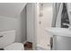 This small bathroom has a white sink and a shower stall at 107 N 12Th St, Erwin, NC 28339