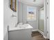 Cozy bathroom features a window and shower stall at 107 N 12Th St, Erwin, NC 28339
