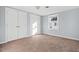 Bedroom includes carpeting, double closets, and a window at 107 N 12Th St, Erwin, NC 28339