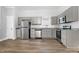 Stylish kitchen with stainless steel appliances and granite countertops at 107 N 12Th St, Erwin, NC 28339