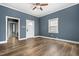 Living Room features vinyl floors, a front door, and a window at 107 N 12Th St, Erwin, NC 28339