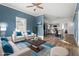Open-concept living room with modern decor and hardwood floors at 107 N 12Th St, Erwin, NC 28339